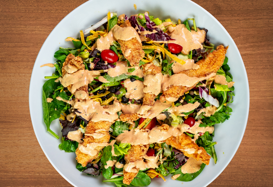 Bowl of Salad on wooden table